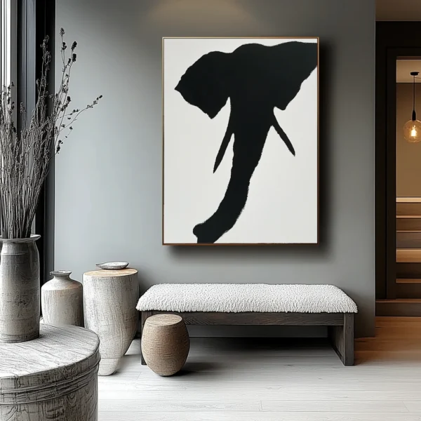 Abstract black elephant head silhouette with rough brushstroke texture on white canvas. Central composition with visible "不" character in negative space. Minimalist monochrome style.