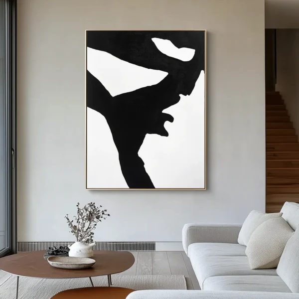 Abstract black geometric human profile silhouette with angular contours against pure white background. No text or discernible details present. Minimalist monochromatic composition.