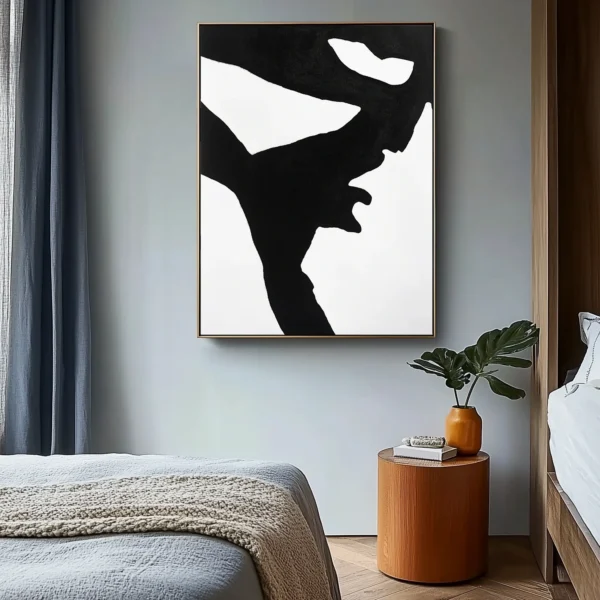 Abstract black geometric human profile silhouette with angular contours against pure white background. No text or discernible details present. Minimalist monochromatic composition.