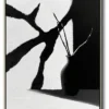 Minimalist oil painting: Black vase holding curved stems stands at lower right, casting shadow on surface. Angular white and charcoal-gray background planes with visible brush texture. No text or discernible words.