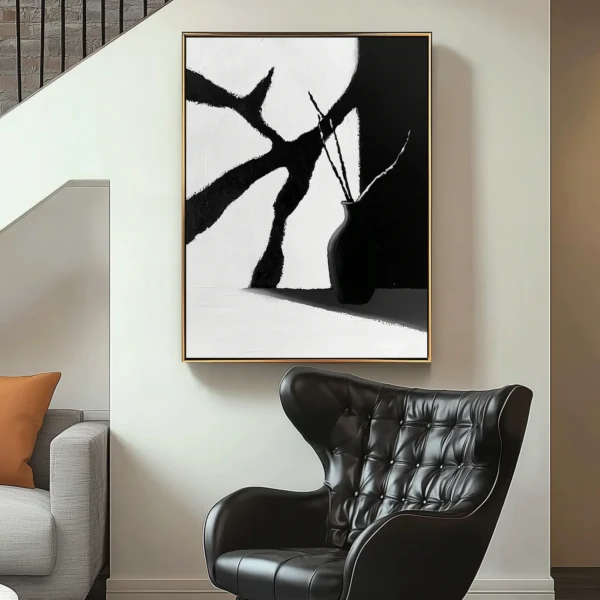 Minimalist oil painting: Black vase holding curved stems stands at lower right, casting shadow on surface. Angular white and charcoal-gray background planes with visible brush texture. No text or discernible words.